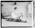 April 1920 Representative Anderson of Minn. enjoys a brisk row in the rowing machine.  Photo courtesy of the Library of Congress. - Click for full-size image!