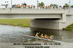 Varsity 4+ with team on bridge - Click for full-size image!