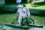 1994. Two men on an unusual, bicycle-powered boat on the Thames during Henley Royal Regatta, Henley-on-Thames, Oxfordshire.  Courtesy of HRR. - Click for full-size image!