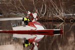 December 25, 2009 - Santa on the Charles, submitted by Linda Muri - Click for full-size image!