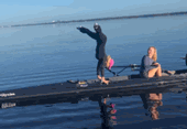 Coxswain does a Handstand